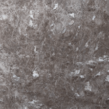 “Emperador Light marble slab with beige-brown tone and natural veining from Nujum Al-Rukham in Saudi Arabia.”
