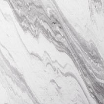 “Fusion Blue marble slab with grey-blue flowing patterns from Nujum Al-Rukham in Saudi Arabia.”