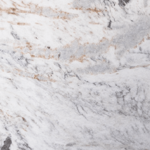 “Afyoun Skini marble slab with white base and grey–beige veining from Nujum Al-Rukham in Saudi Arabia.”