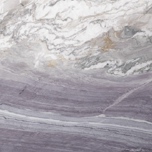 “Purple Eastern marble slab with purple, grey, white, and gold flowing patterns from Nujum Al-Rukham in Saudi Arabia.”