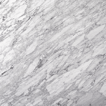 “Venato marble slab with bright white base and detailed grey veining from Nujum Al-Rukham in Saudi Arabia.”
